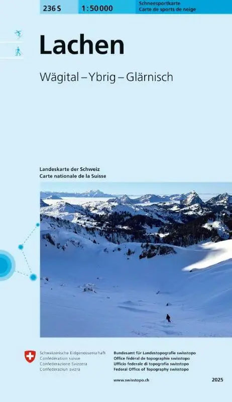 Sneeuwbedekt bergketen met scherpe toppen en een enkele skiër op de 236s lachen schneesportkarte route