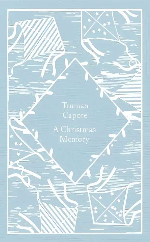 Lichtblauwe omslag van little clothbound classics boek a christmas memory van truman capote met witte lijntekening