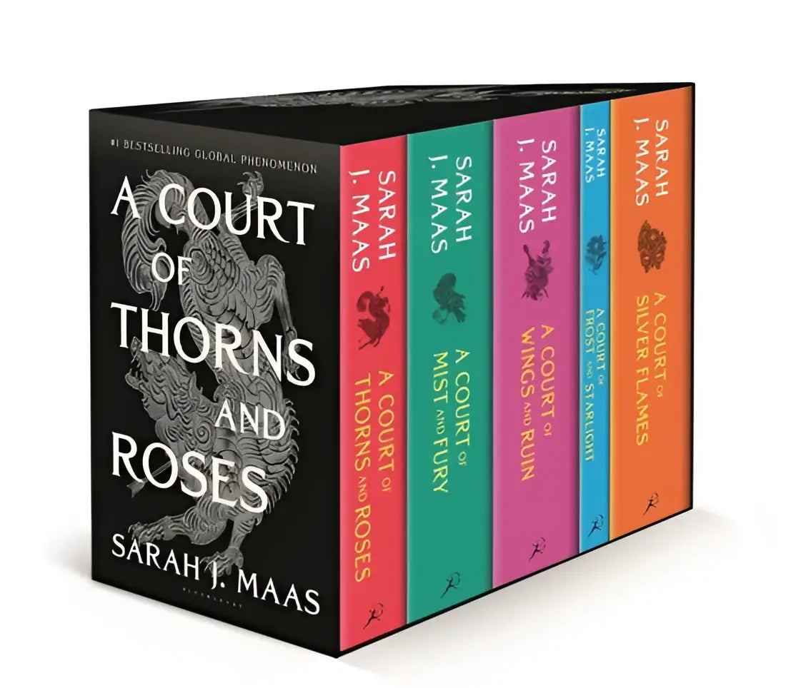 Zwarte hardcover box set met kleurrijke ruggen van de a court of thorns and roses serie door sarah j voor thorns and roses fans