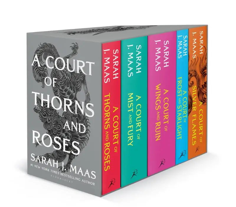 Grijze hardcover box set van a court of thorns and roses serie door sarah j met paperback boeken en rozen thema