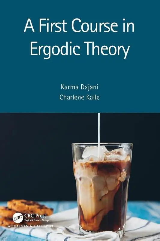 A clear glass tumbler with iced coffee and cream pour illustrating ergodic theory first course for readers with interest