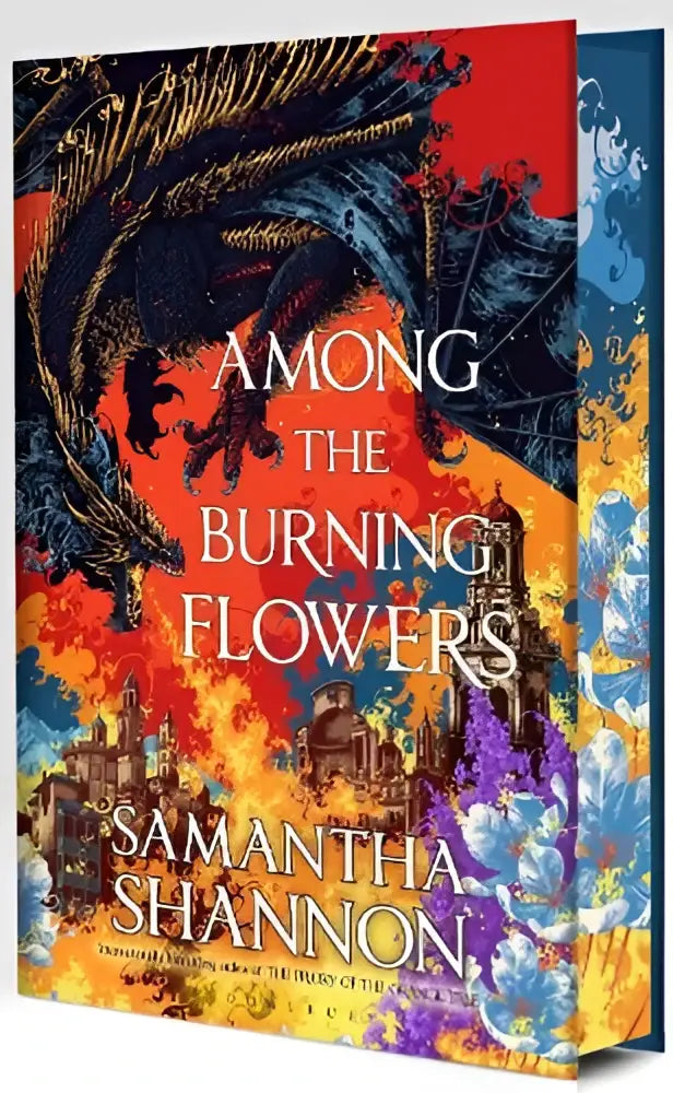 De levendige hardcover van among the burning toont een vuurige omslag met rood, oranje, blauw en paars
