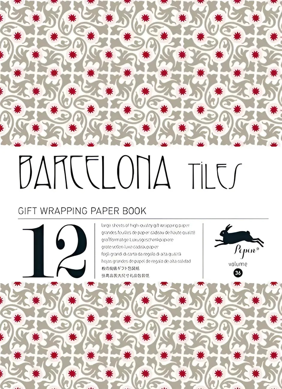 Boek met barcelona tiles cadeaupapier met elegante grijze en rode bloemenpatronen op hoogwaardig papier