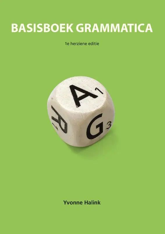 Witte kubusvormige dobbelsteen met zwarte letters en cijfers gebruikt voor basisboek grammatica