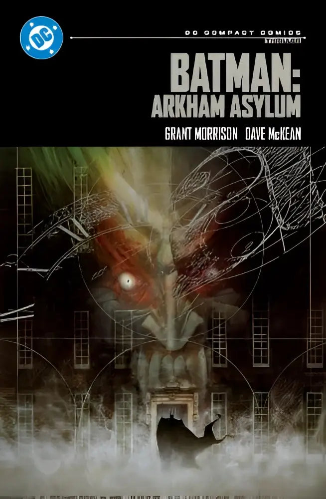Batman arkham asylum dc compact comics met gedurfde zwart-wit illustraties en rood gloeiende ogen op de voorkant