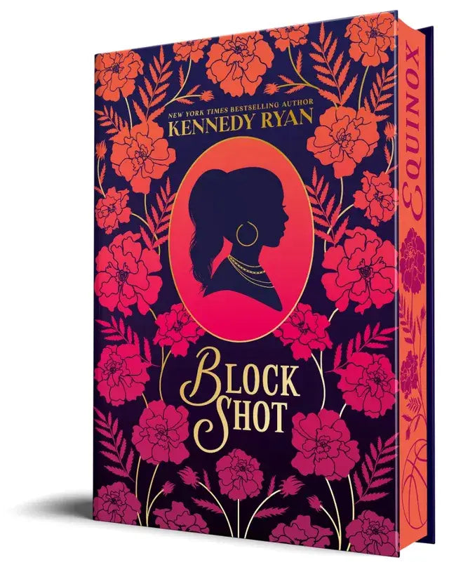 Een hardcover boek block shot deluxe edition met een levendig bloemenpatroon in oranje en roze op marineblauw