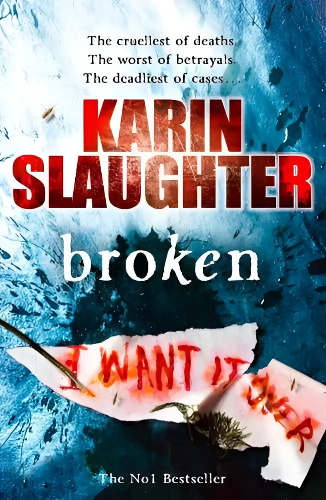 De boekcover van broken door karin slaughter toont rode letters met een donkerblauwe achtergrond en gebroken glas en verwijst naar the will trent serie