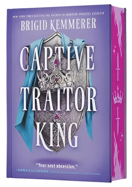 Paars hardcover boek captive traitor king deluxe limited edition met zilverblauw sierlijk ontwerp van brigid kemmerer