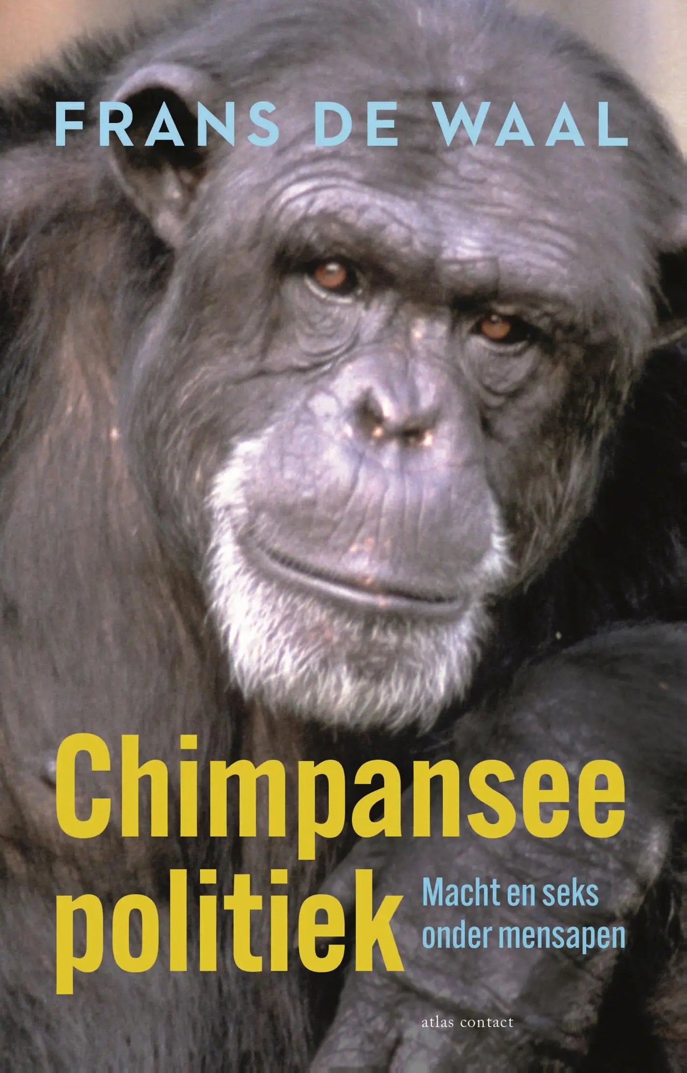 De boekcover toont een close-up van een chimpansee met donkere vacht en witte gezichtsbeharing over macht en seks onder mensapen