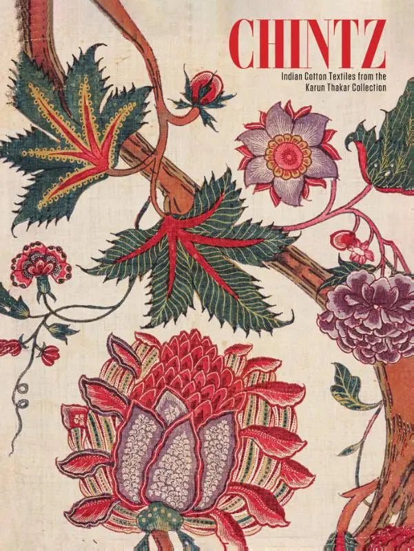 Vibrant indian cotton textiles from the Karun Thakar collection with bold reds purples and greens floral embroidery