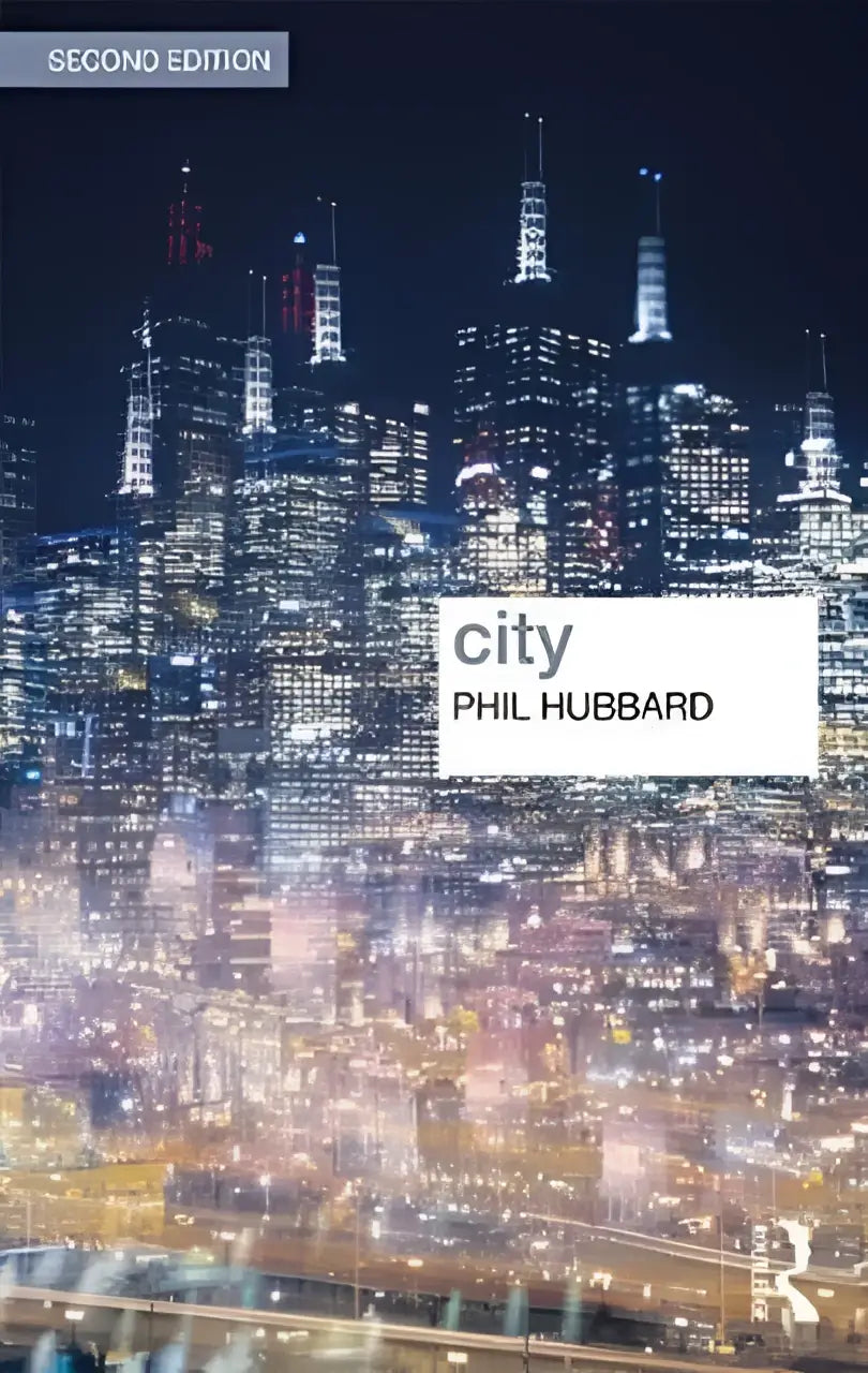 The book cover of city by phil hubbard features a vibrant nighttime cityscape on this extensively updated second edition