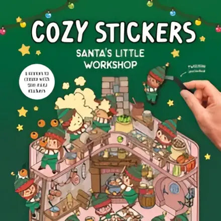 Cozy stickers santa’s little workshop activity book met kleurrijke illustraties en een hand die een sticker vasthoudt