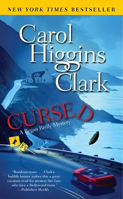 The book cover of cursed by carol higgins clark shows a red car on a coastal road in the regan reilly mystery series