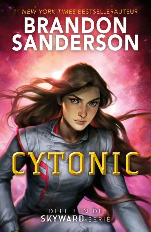 A jonge vrouw met lang bruin haar en blauwe ogen draagt een grijze gewatteerde jas met rode accenten in cytonic van brandon sanderson