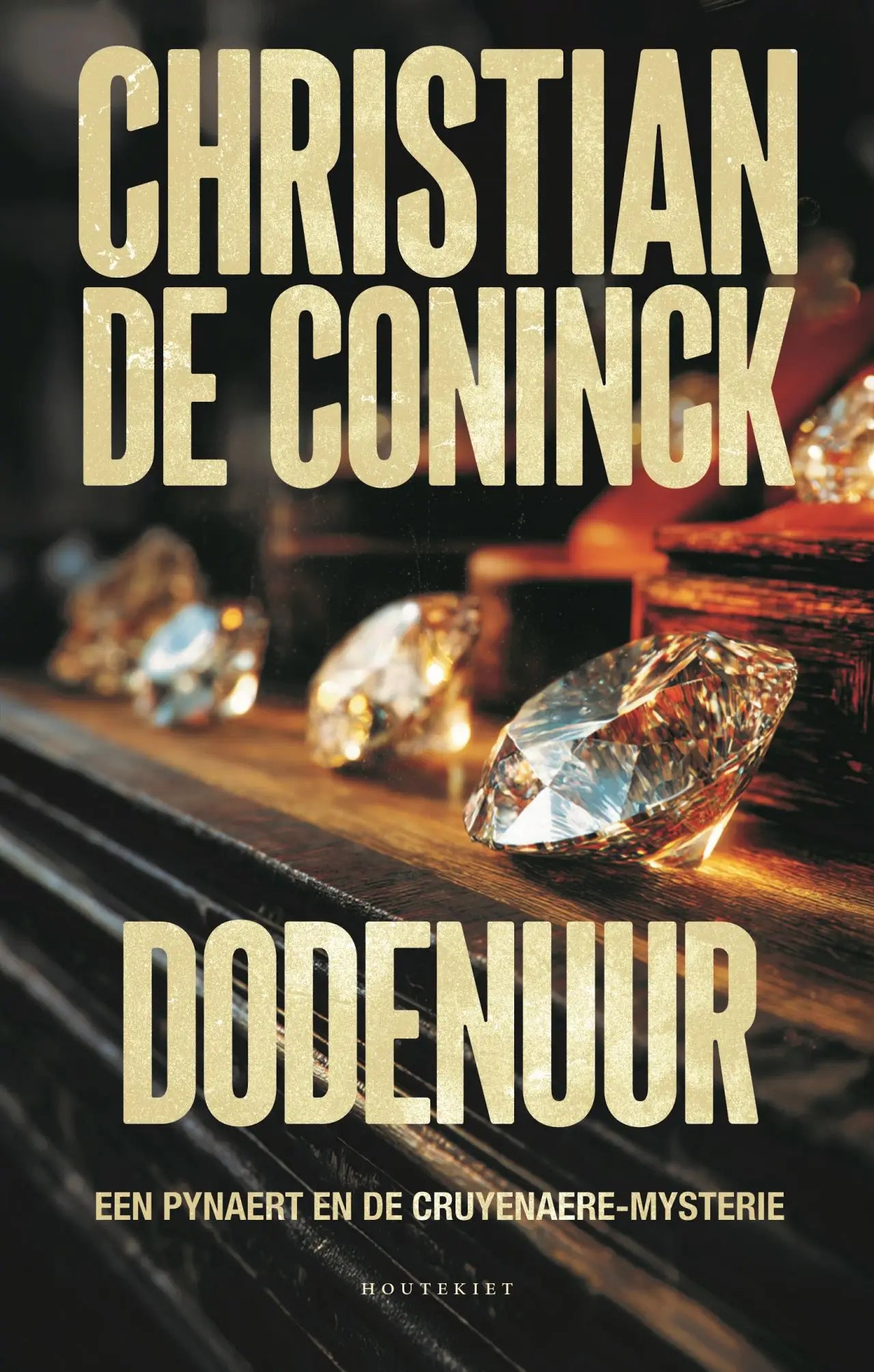 De Dodenuur boekcover toont grote, geslepen diamanten op donkere houten oppervlakken