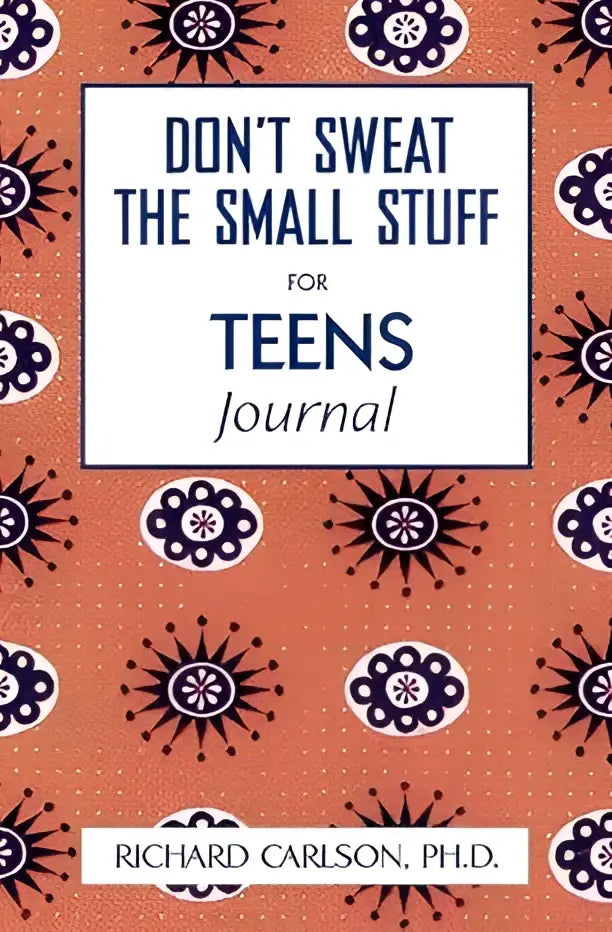 Oranje journal met zwart wit bloemmotief getiteld dont sweat the small stuff for teens van richard carlson