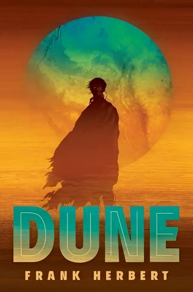 De cover van dune deluxe hardcover edition toont een silhouet voor een grote planeet met teal en oranje kleuren