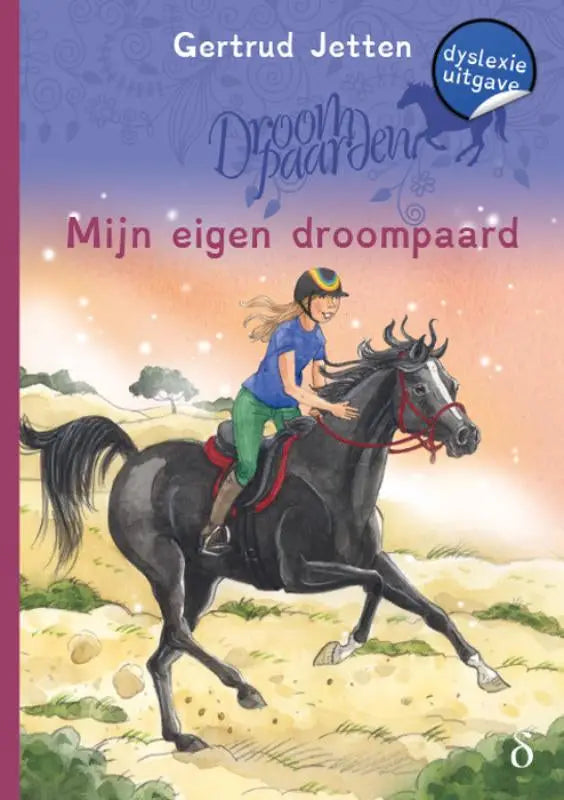 De voorkant van het kinderboek Mijn eigen droompaard door Gertrud Jetten toont een zwart paard met rood hoofdstel en blauwe ruiter