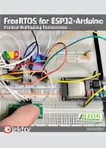 Close-up of arduino esp32 development board with colored pins for freertos for esp32-arduino applications