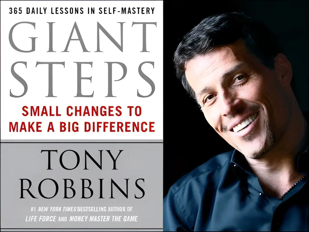 Cover van het boek giant steps van tony robbins met grijze en rode tekst op witte achtergrond en een glimlachende portretfoto