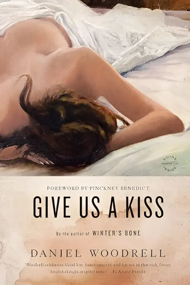 De boekcover van give us a kiss een roman toont een impressionistische schildering van een vrouw met donker haar op wit beddengoed