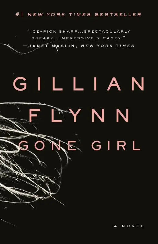 Black book cover of gone girl special edition by gillian flynn with pink text and white wispy hair design