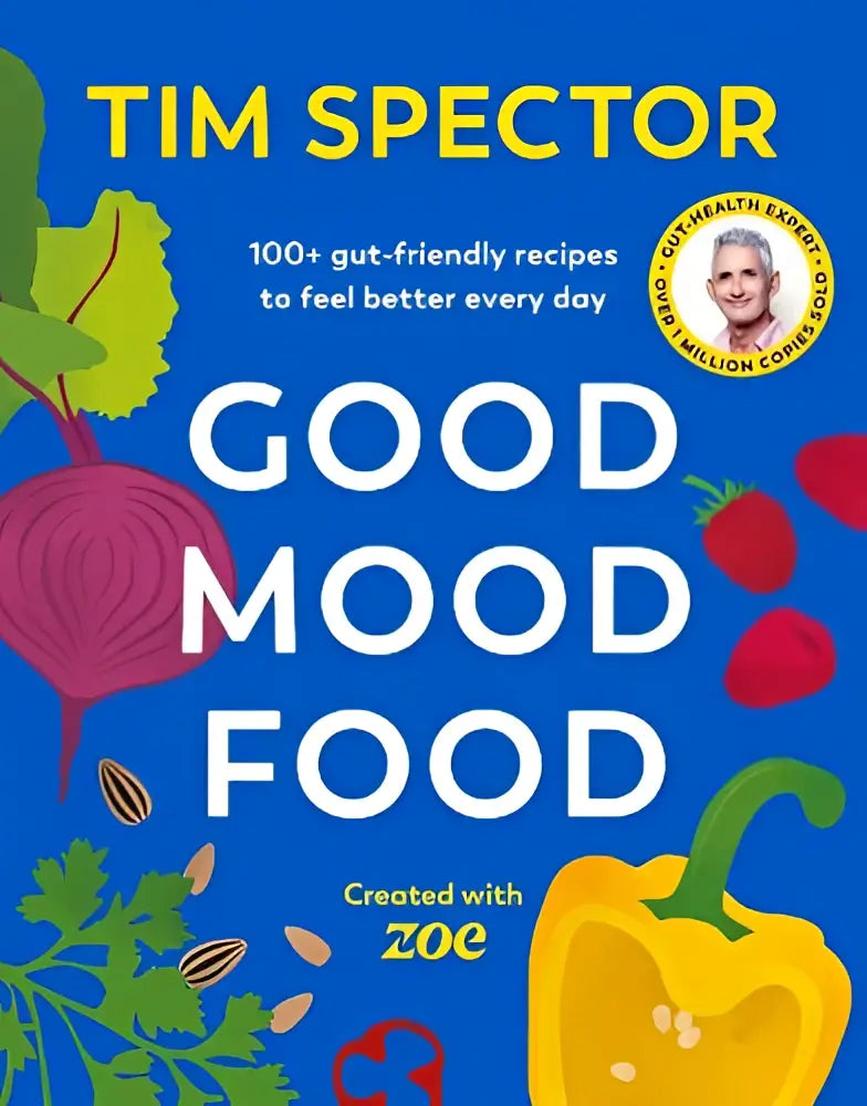 Blauwe kookboek good mood food van tim spector met levendige illustraties van groenten en fruit op de kaft