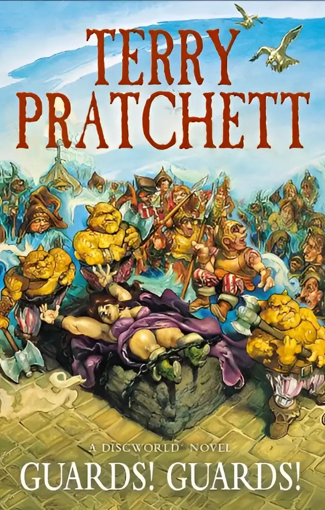 De cover van guards guards een discworld novel toont een kleurrijke illustratie met dynamische personages en bergen