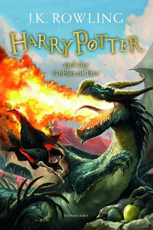 De cover van het boek harry potter and the goblet of fire toont de magische school op een kleurrijke achtergrond bestel harry potter