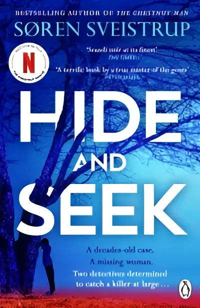 Het boek hide and seek heeft een donkerblauwe omslag met witte titel en silhouetten van kale bomen