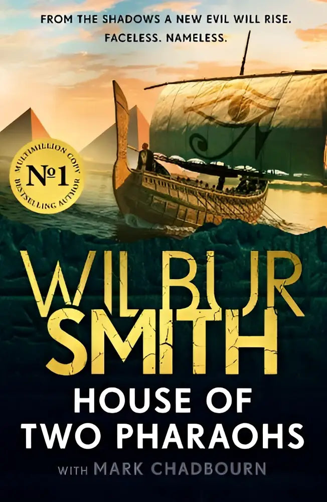 De cover van house of two pharaohs toont een gouden egyptisch zeilschip met houten details tegen een dramatische zonsondergang