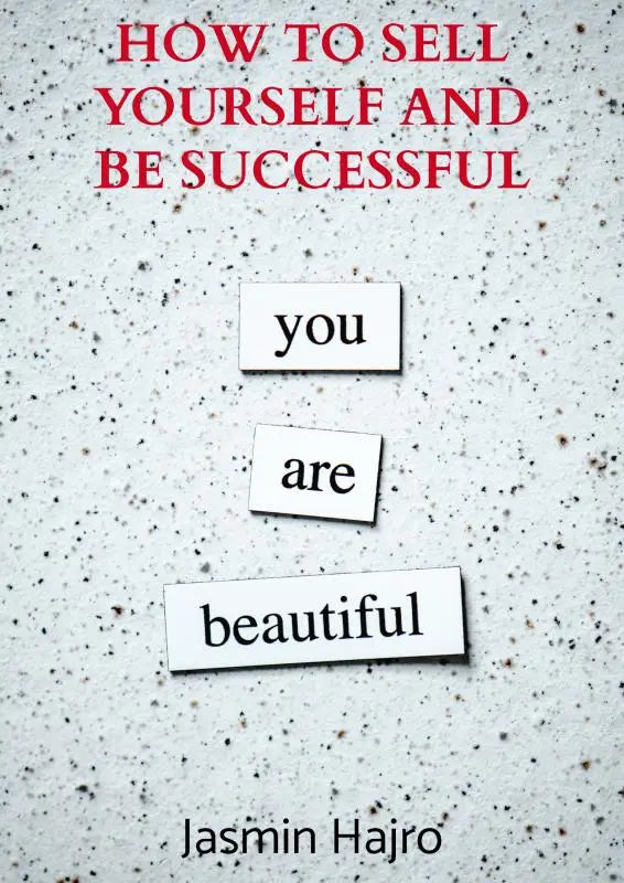 Het boek how to sell yourself and be successful toont rode tekst en witte magnetische letters met de boodschap you are beautiful