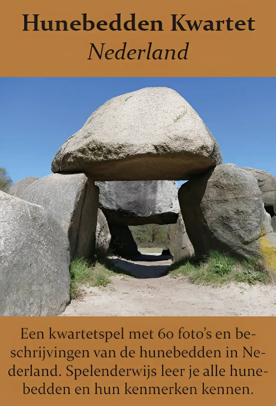 Een grijze stenen hunebed met grote deksteen op zuilen in een open veld onder blauwe lucht hunebed kwartet nederland