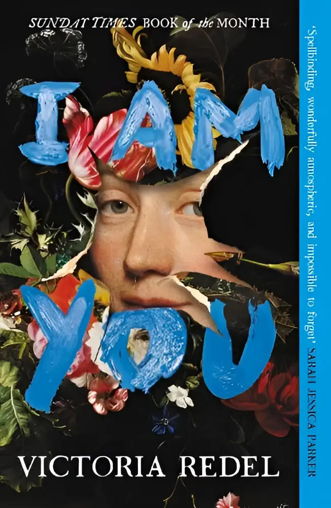 Boekcover van i am you met blauwe letters en bloemen collage als sunday times pick van de maand