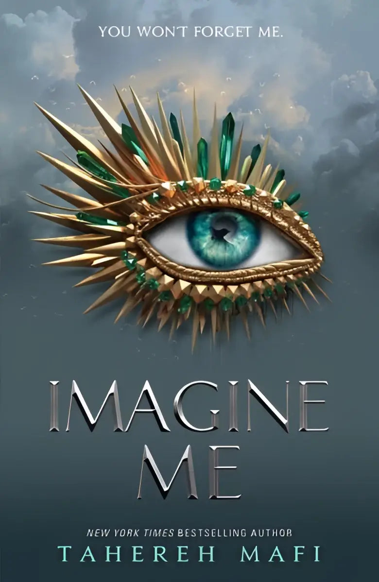 De boekcover van imagine me tahereh mafi toont een gouden stekelige oog met smaragdgroene edelstenen en een blauwe iris