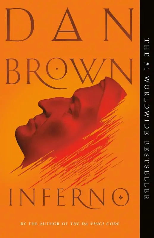 Boek inferno van dan brown met oranje kaft en rode silhouet van mannenhoofd en donkerbruine letters