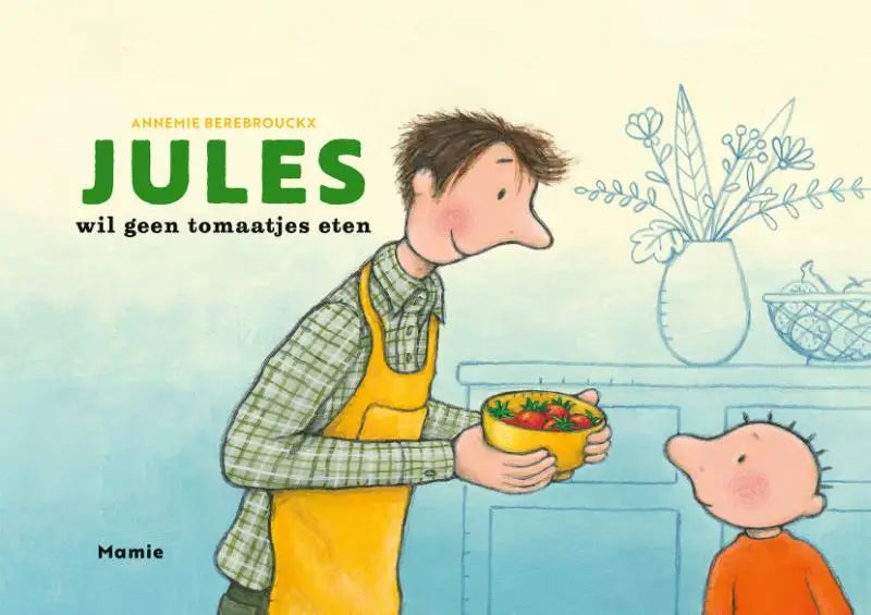 Man in oranje schort houdt gele kom vol rode aardbeien jules wil geen tomaatjes eten productfoto