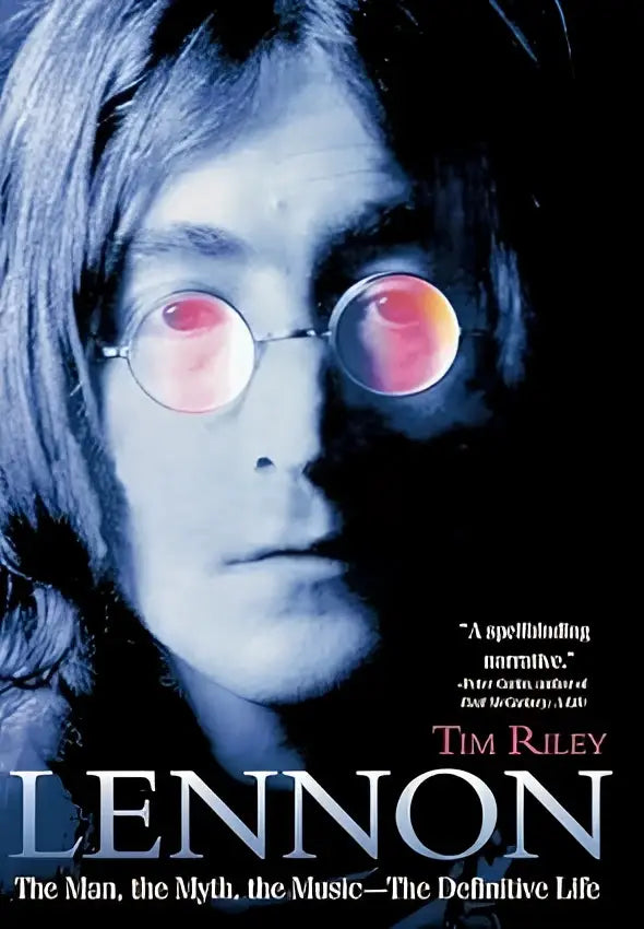 Blue-toned portrait of john lennon wearing round reflective glasses with red lenses for tim riley the man the myth myth the music