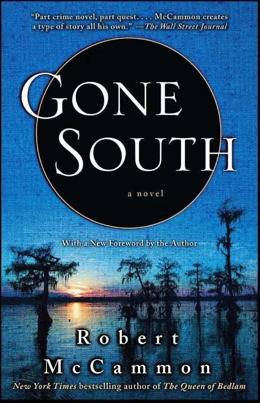 Blue book cover for mccammon r gone south featuring white serif title in black circle with cypress silhouettes at orange sunset