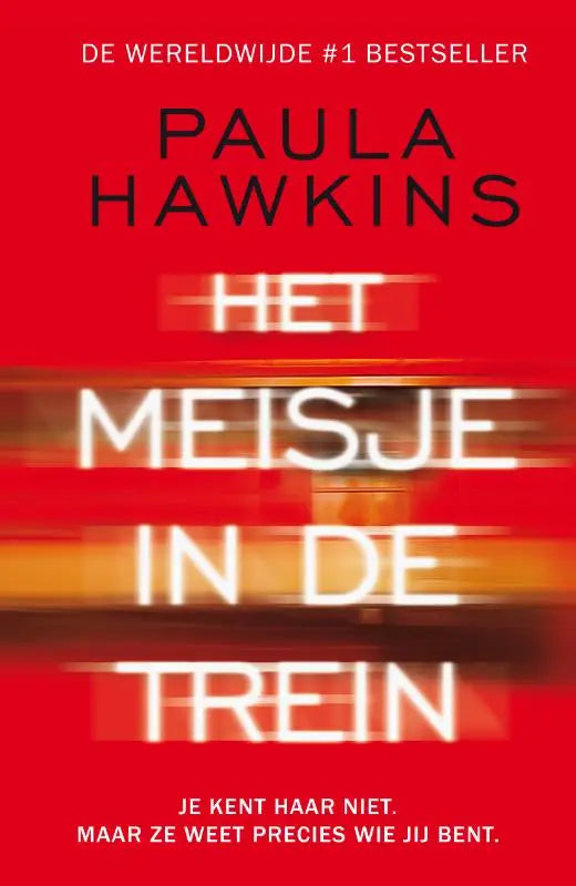Rood boekomslag van het boek het meisje in de trein met dikke witte tekst en vervaagde bewegingsachtergrond