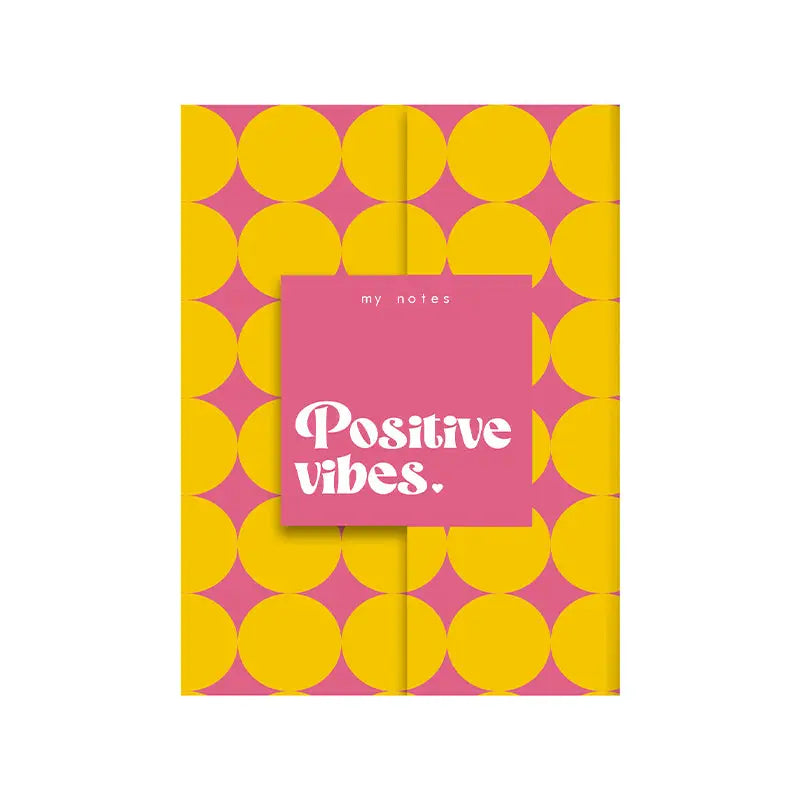 A5-notitieboekje my notes positive vibes met cirkelpatroon in roze en geel en centrale label met inspirerende tekst