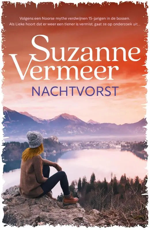 De nachtvorst boekcover van suzanne vermeer toont een berg- en meerlandschap met warme oranje en paarse tinten