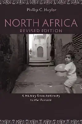 The book cover of North Africa revised edition shows a dark arched alleyway in North Africa with two figures walking away