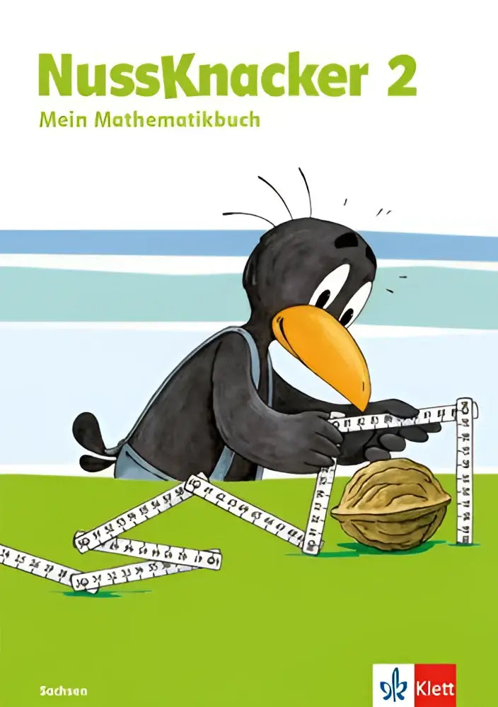 De cover van der nussknacker schülerbuch 2 schuljahr ausgabe für sachsen toont een zwart vogeltje met maatlint naast een walnoot