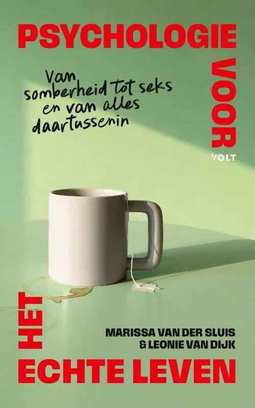 Minimalistische witte keramische mok met eenvoudig handvat op lichtgroene ondergrond, passend bij psychologie voor het echte leven en alles daartussenin