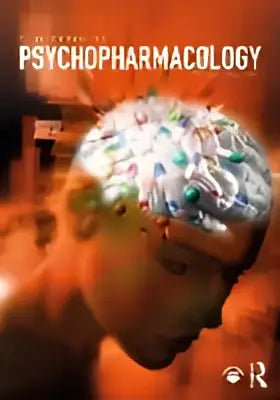 De omslag van het boek psychopharmacology toont een gloeiende, doorschijnende hersenillustratie met neurale paden op een oranje verloopachtergrond
