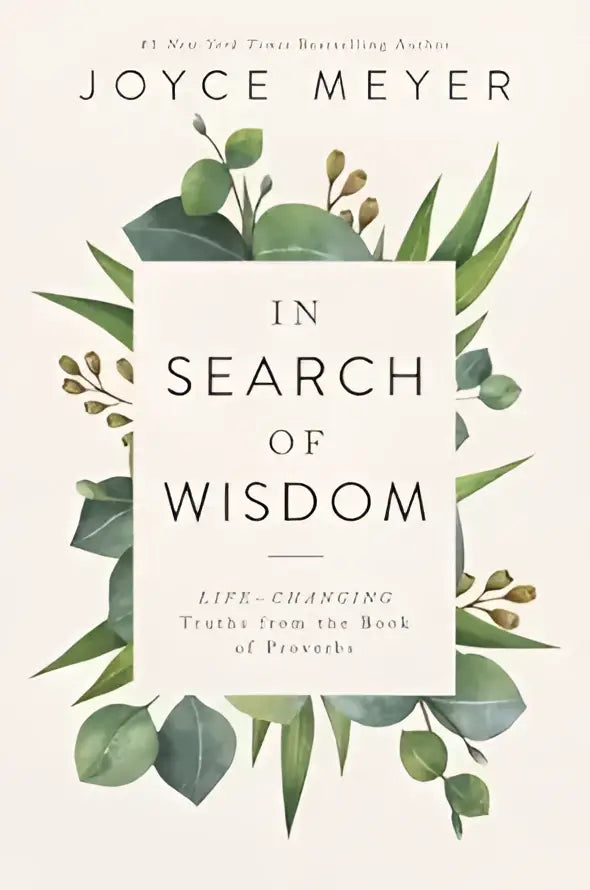 De boekomslag van in search of wisdom toont een zachte offwhite achtergrond met groene botanische illustraties en zwarte serif tekst