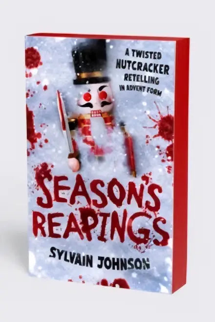 Boekcover van season’s reapings van sylvain johnson met rode en witte kleuren en een houten notenkraker in sneeuw