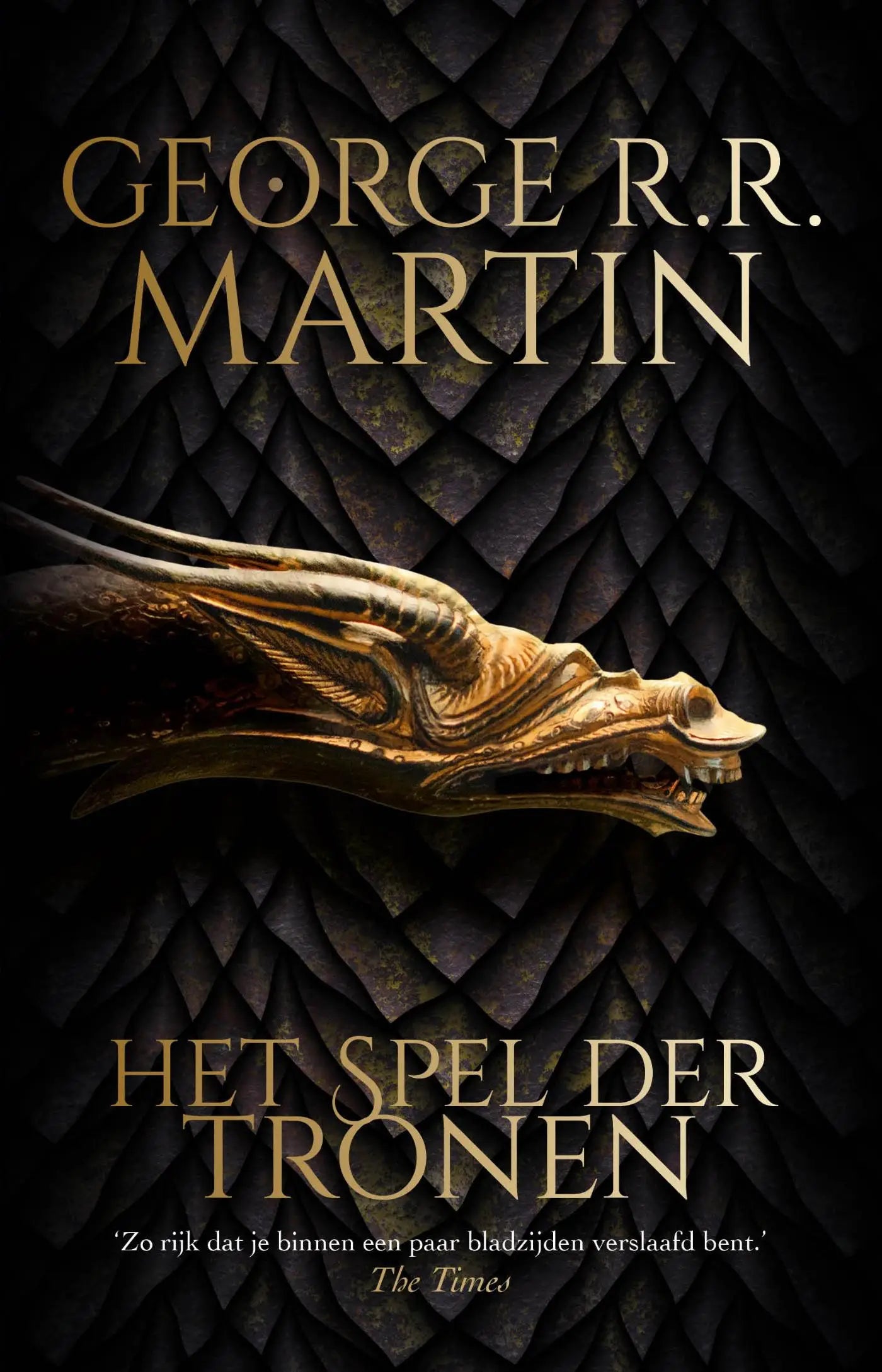 Golden dragon head ornament with intricate scales and sharp teeth from het spel der tronen a game of thrones against dark background