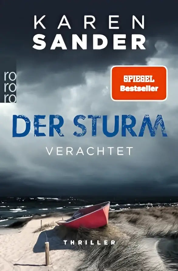 Rode roeiboot op zandstrand onder stormachtige lucht bij thriller der sturm verachtet